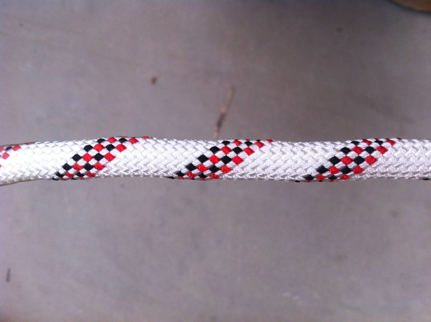 Red and white tracer polyethylene line close-up