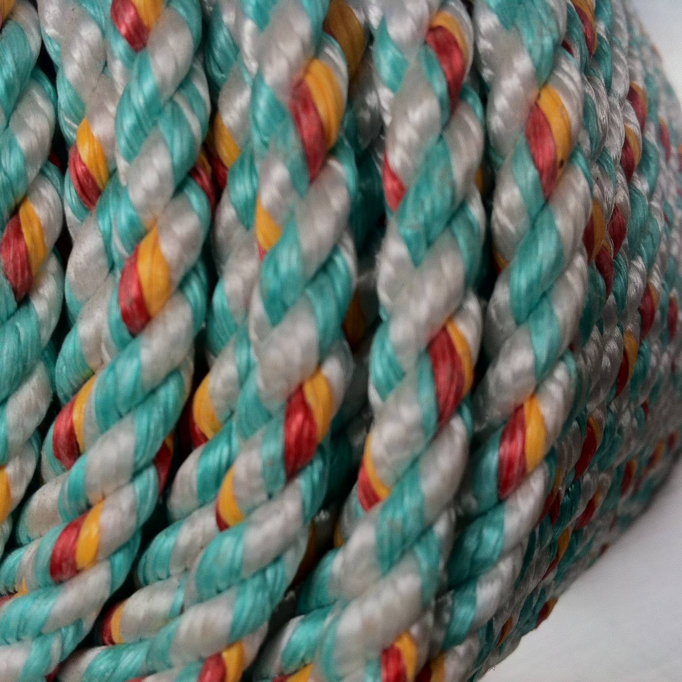 Single blue polyethylene 3-strand twisted rope coil, top-down view