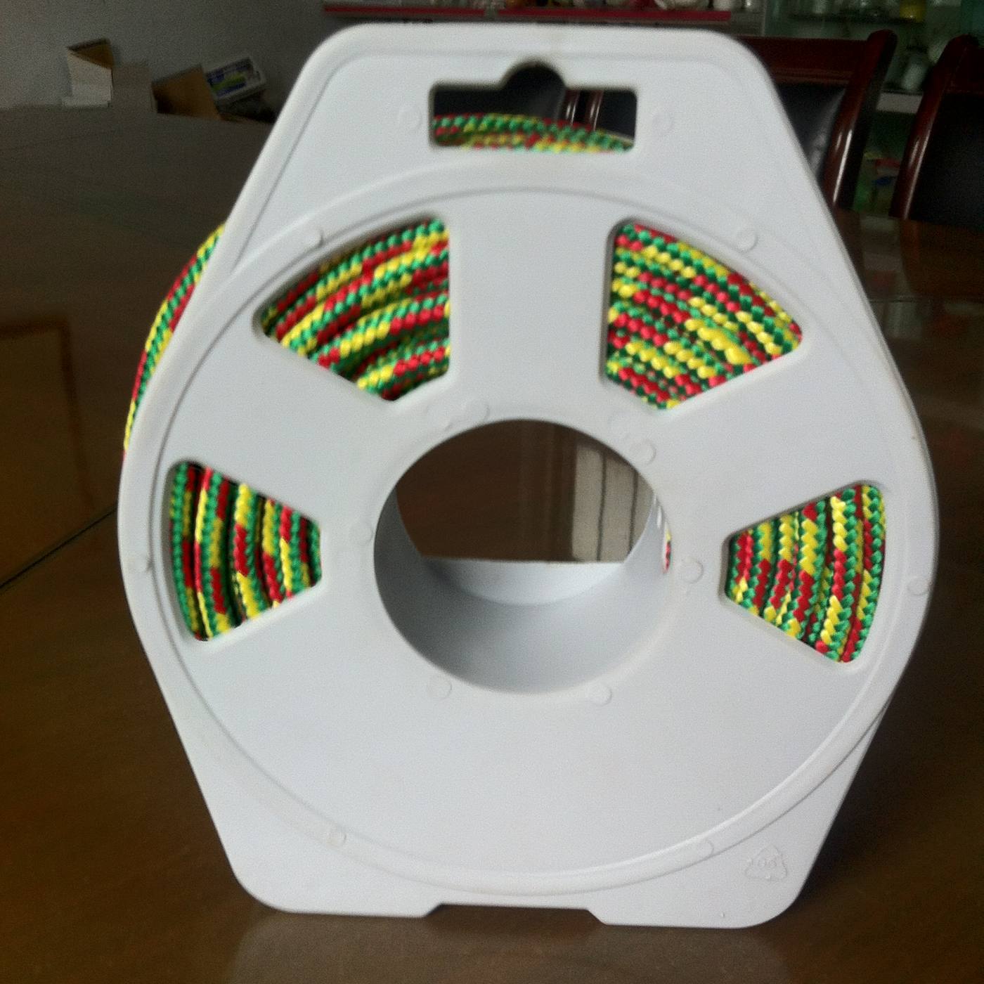 Multi-color electric-fence polyrope on an unbranded plastic reel