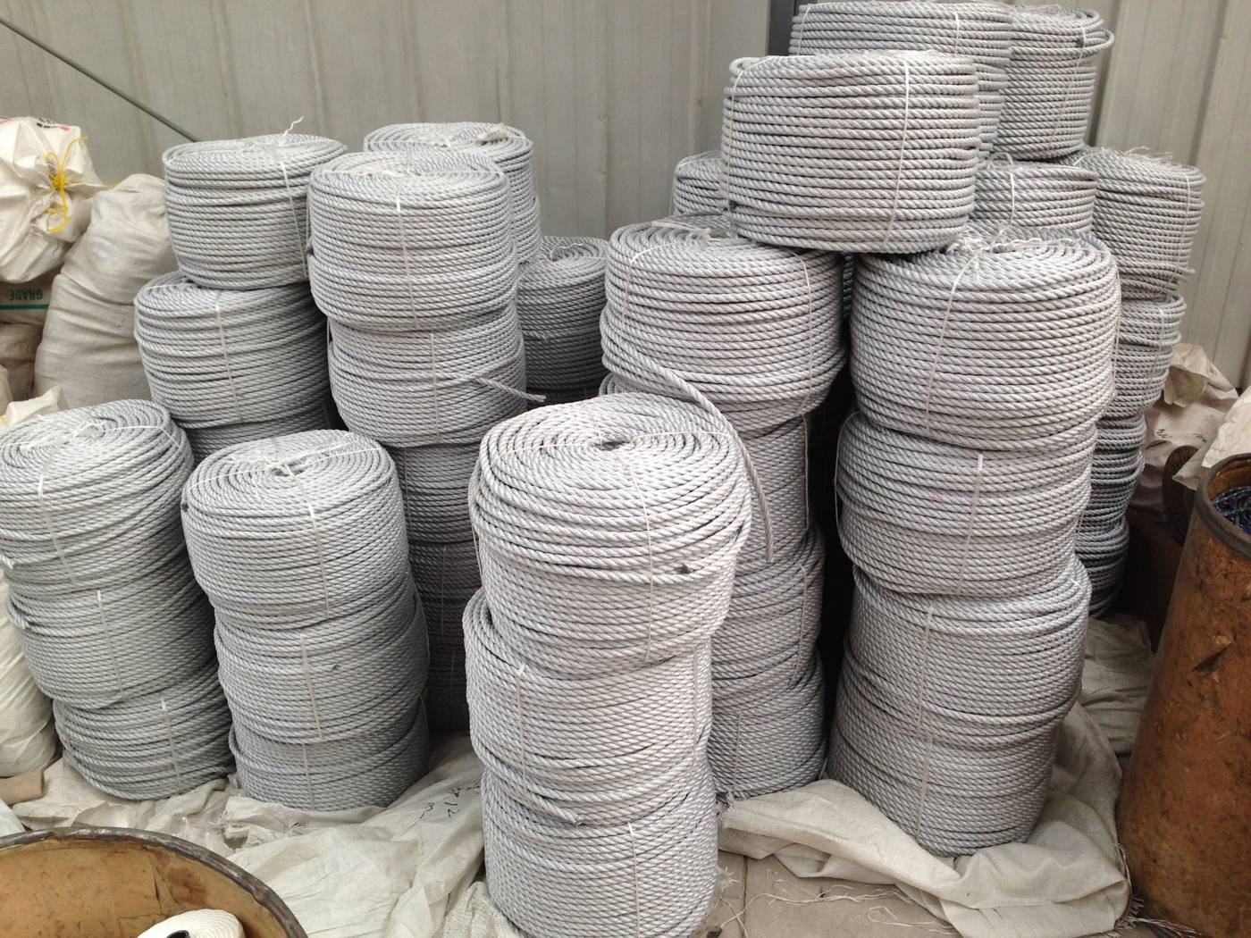 Grey double-braided nylon rope in stacked skeins