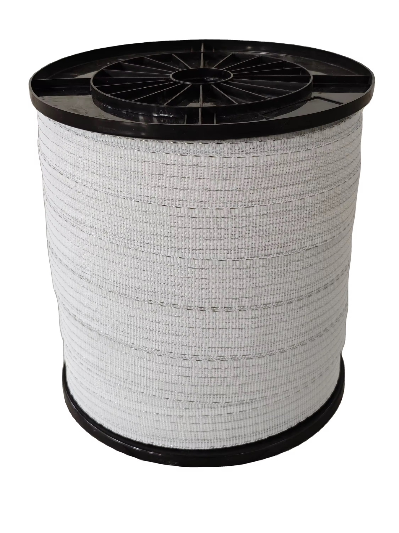 White electric fence polytape with visible metal conductor strands on a plastic reel