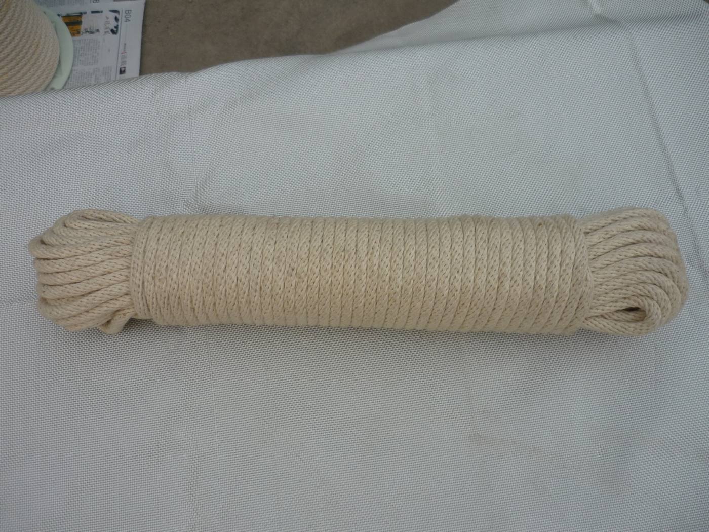 Natural cotton 3-strand twisted rope on tall industrial spools